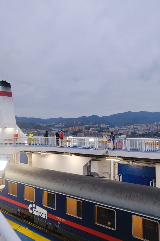 Image of shunted train in the lower deck of ferry to Messina, Sicily from mainland Italy